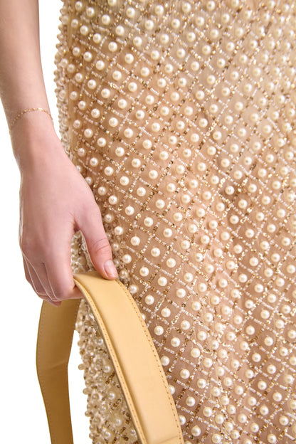 Stylish short sheer dress with a chic straight hemline, adorned with exquisite hand embroidered pearls, designed by Helen Anthony in Italy.