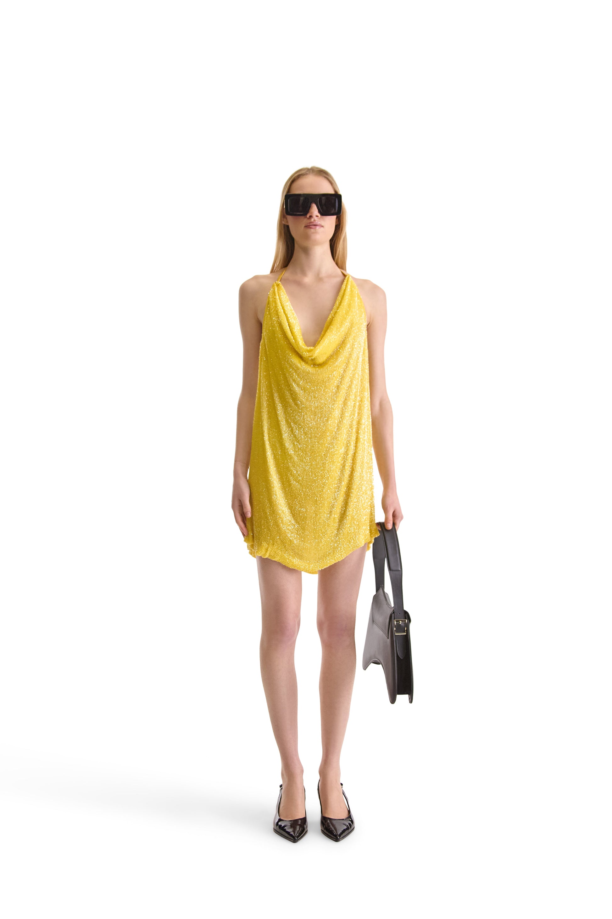 Elegant hand embroidered backless dress with intricate beading and silk lining, showcasing luxurious craftsmanship and a stylish tie neckline - Made in Italy.