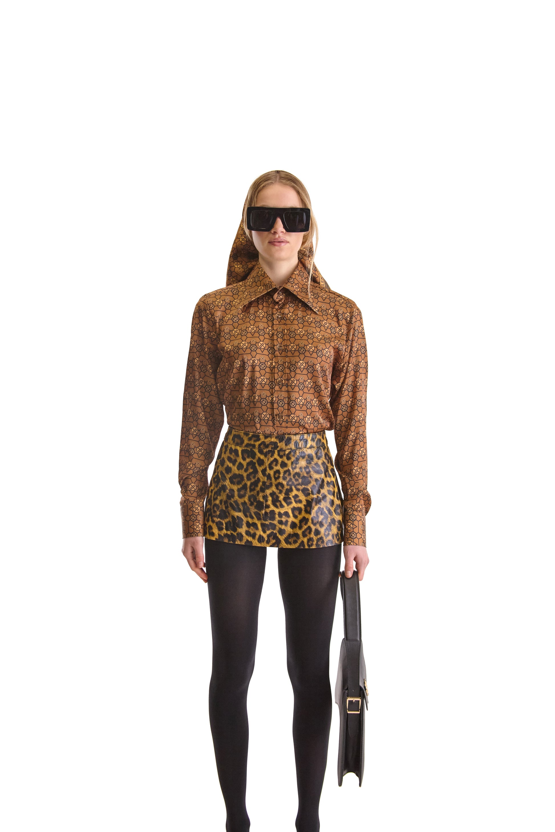 Close-up of the luxurious woven fabric of the tailored monogram shirt exemplifying quality and Italian craftsmanship.