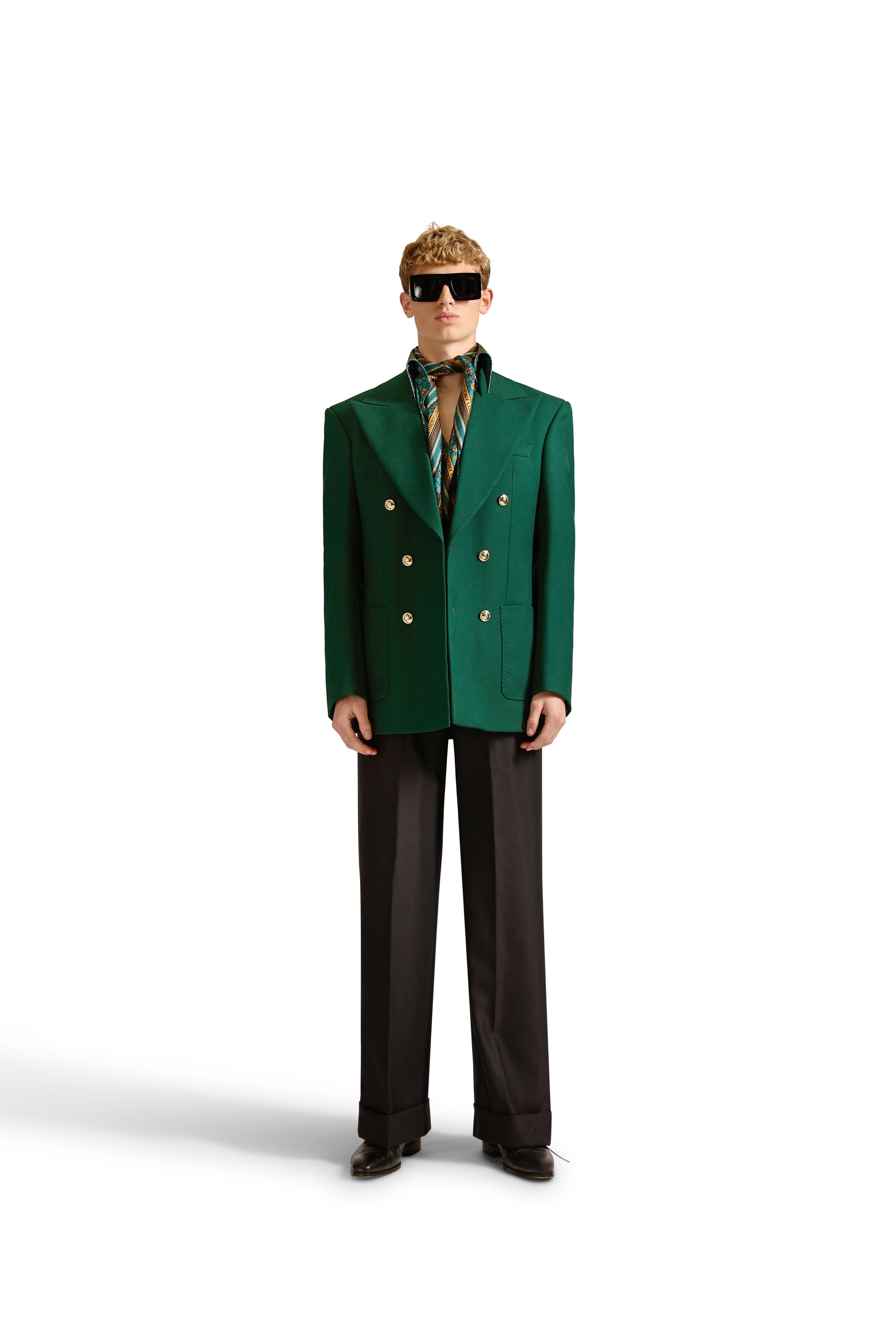 Stylish details of a luxury monogram print shirt showcasing long sleeves and a curved hem, made in Italy by Helen Anthony.