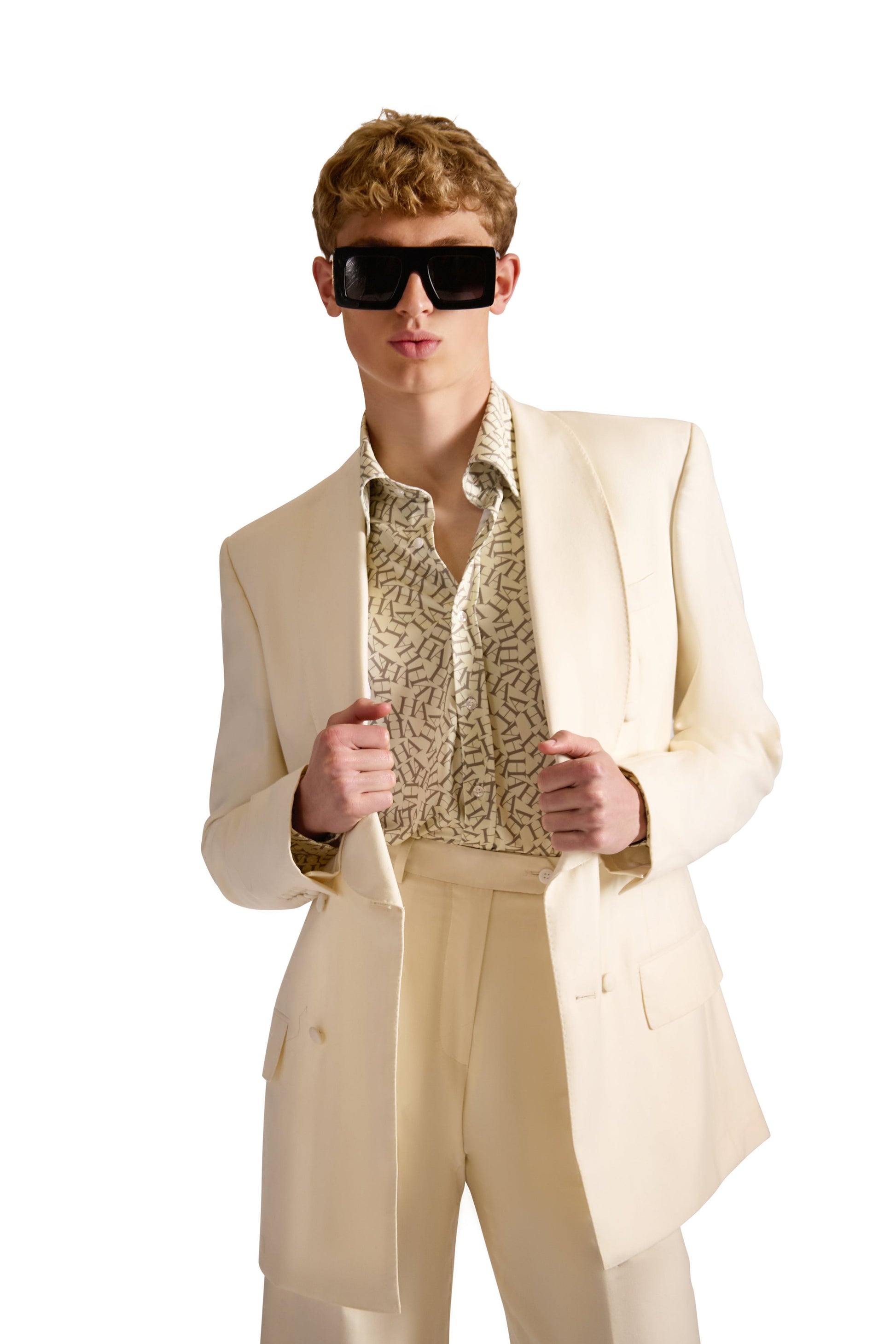 Sophisticated monogrammed shirt draped elegantly, made from a luxurious blend of 90% polyester and 10% lycra, ideal for upscale occasions.