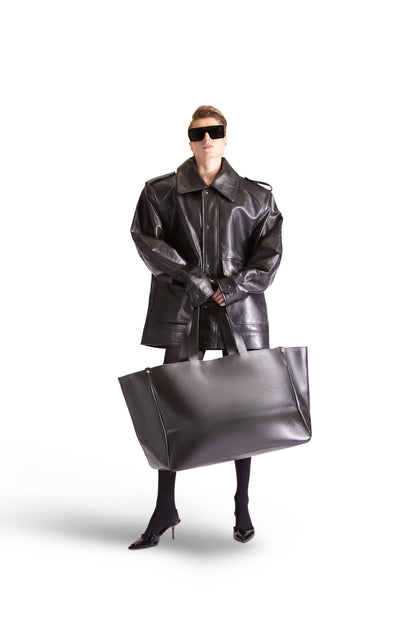 Luxury oversized leather shoulder Tote Bag by Helen Anthony, showcasing its elegant design and spacious interior with zips and pockets.