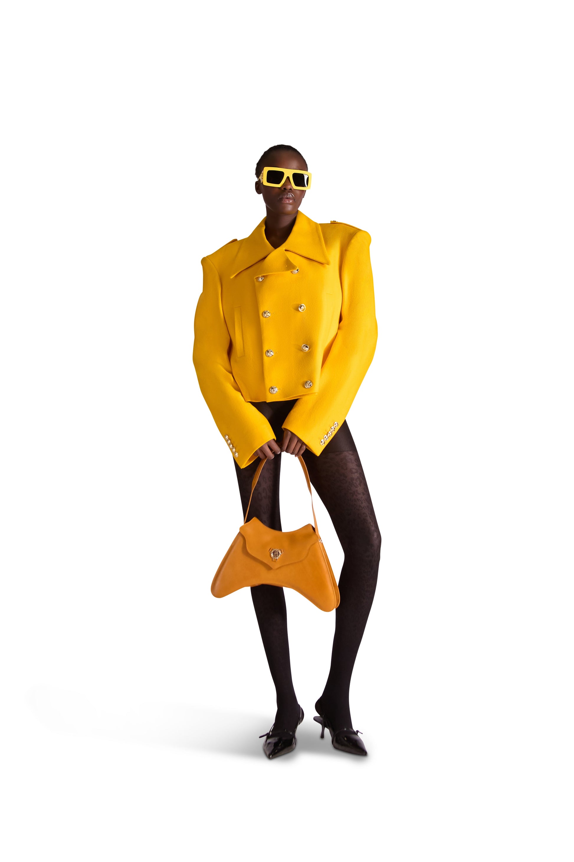 Luxury Helen Anthony calfskin leather small shoulder bag with gold finish and exclusive monogram logo, elegantly designed in Italy, featuring a magnetic snap closure and adjustable leather strap.