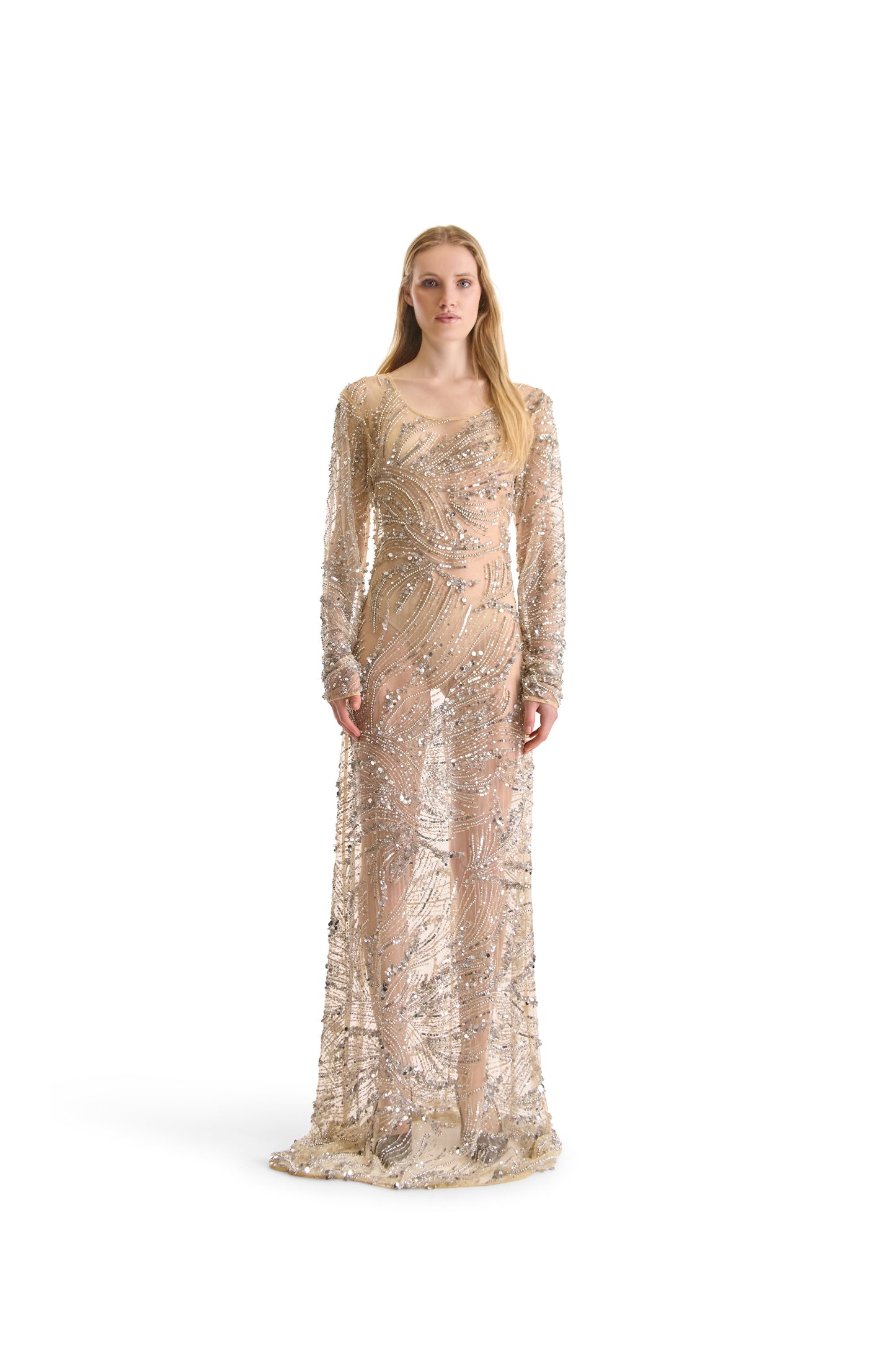 Luxurious long sleeved evening dress by Helen Anthony, featuring exquisite hand embroidery with silver beads and sequins on delicate mesh fabric, made in Italy.