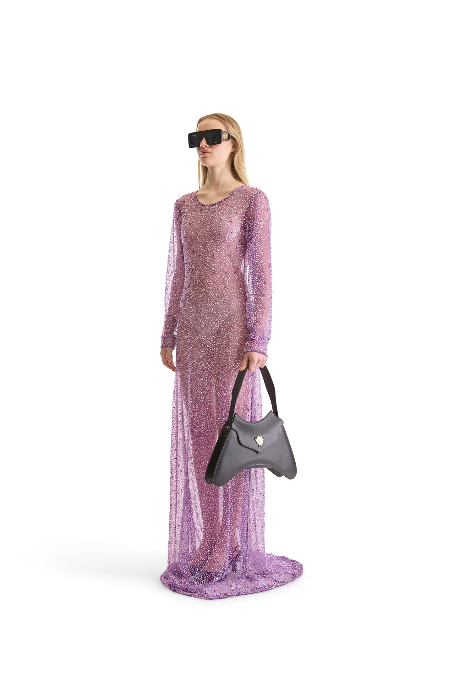 Luxury sheer evening dress with long sleeves, intricately hand embroidered with beads, showcasing exquisite mesh fabric for a sophisticated look.