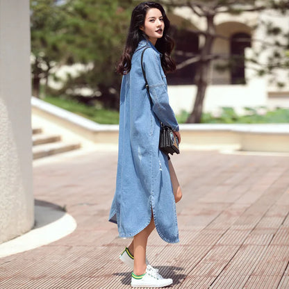 Elegant plus size denim trench coat for women with hollow design and long silhouette, perfect for a fashionable casual outfit.