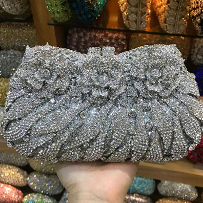 Exquisite Metallic Minaudiere Clutch for women, adorned with sparkling rhinestones, showcasing a sleek, solid design ideal for evening outings.