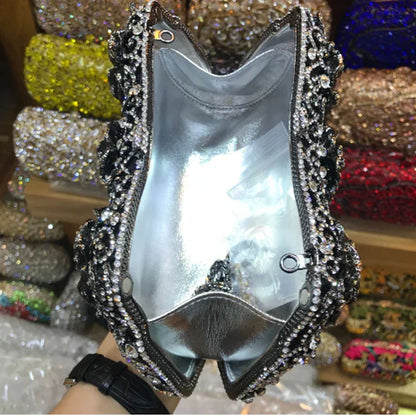 Stylish luxury women's evening clutch bag displayed elegantly, highlighting its hard structure and sophisticated solid design.