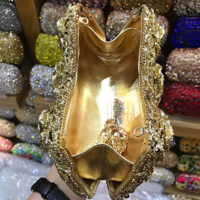 Glamorous metallic minaudiere clutch bag for women, ideal for evening events, featuring a simple yet elegant design.