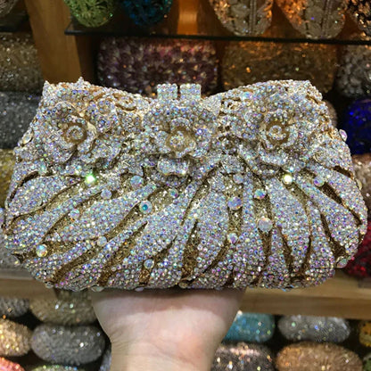 Chic solid design luxury clutch bag for women, featuring metallic shine and stunning rhinestones for a touch of elegance.