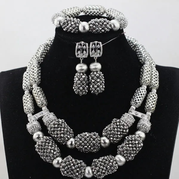 Gleaming pair of stud earrings from a luxury purple jewelry set, crafted with crystal and gold-plated copper alloy, perfect for adding elegance to any outfit.