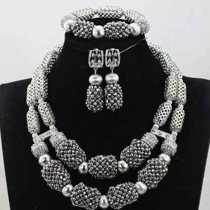 Gleaming pair of stud earrings from a luxury purple jewelry set, crafted with crystal and gold-plated copper alloy, perfect for adding elegance to any outfit.