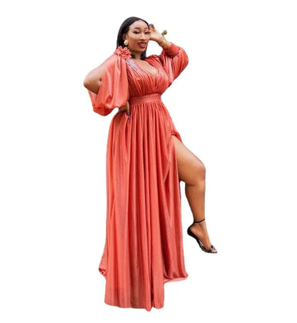 Full body view of a woman wearing a stylish African maxi dress in kanga design, perfect for traditional and casual occasions.