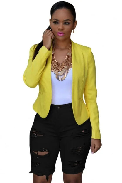 Close-up detail of luxurious women's ripped denim shorts featuring exquisite stitching and pocket design, perfect for casual summer wear.