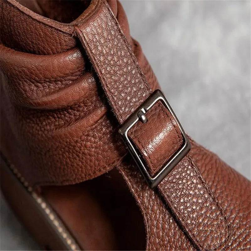 Close-up view of luxurious women's vintage leather gladiator sandals showcasing the intricate design and quality craftsmanship.