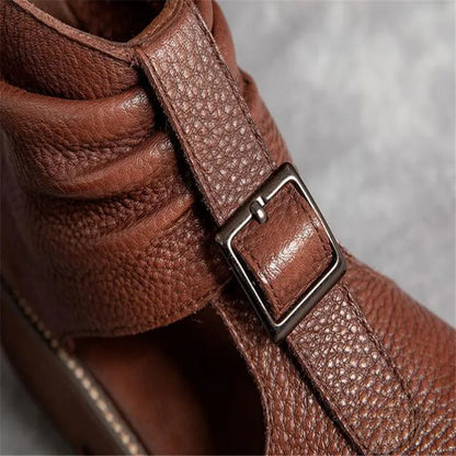 Close-up view of luxurious women's vintage leather gladiator sandals showcasing the intricate design and quality craftsmanship.