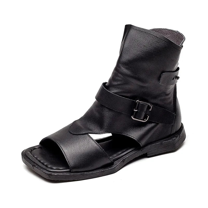 Fashion-forward flat sandals in rich, authentic leather, embodying a blend of casual style and luxurious feel, perfect for modern women.