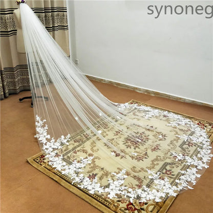 Dramatic shot of a cathedral veil cascading down in a graceful flow, highlighting its elegant and timeless appeal.