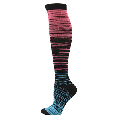 Men's and Women's activewear Flightwear Compression Socks featuring vibrant pink and blue tones, designed for athletes seeking elegance and functionality.