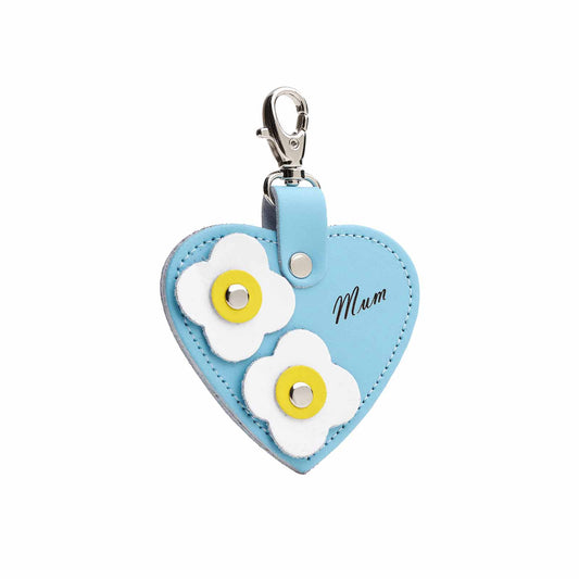 Luxury Pastel Blue Love Heart Bag Charm featuring 'Mum' engraving and floral appliques, crafted from high-quality leather, ideal for elegant gifting on special occasions.