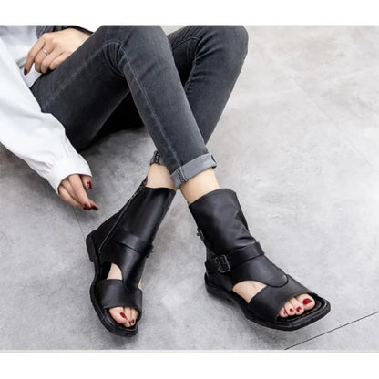 Elegant flat sandals crafted from genuine cow leather, showcasing a classic Roman style ideal for summer outings.