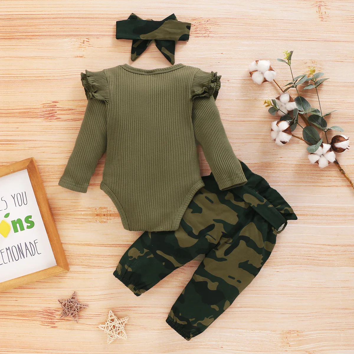 Stylish luxury camouflage outfit for infants, featuring a knitted pullover design, perfect for boys and girls.