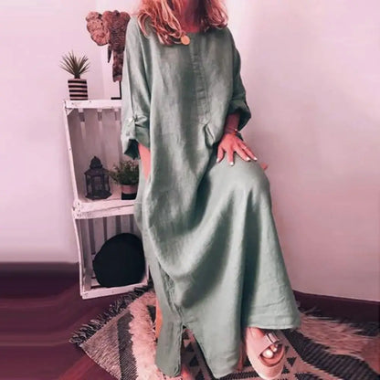 Chic women's kaftan dress showcasing a rich solid colour, designed for summer elegance. The breathable cotton material offers comfort and style for any casual outing.