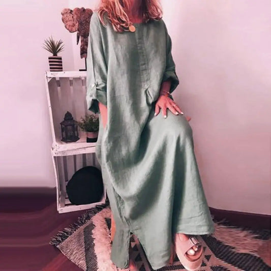 Chic women's kaftan dress showcasing a rich solid colour, designed for summer elegance. The breathable cotton material offers comfort and style for any casual outing.