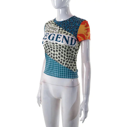 Luxurious Sweet Legend Women's Vibrant Print Cropped Tee by Dazzling Dreams Studio, showcasing whimsical design with vibrant hues perfect for chic wardrobes.