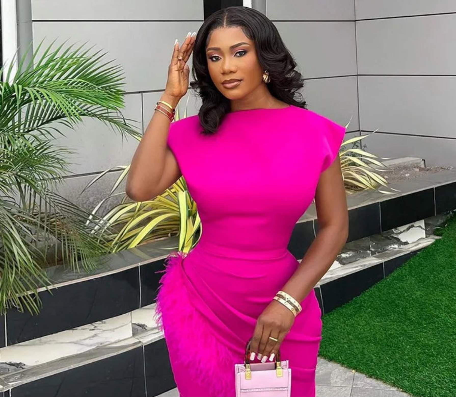 Sophisticated and stylish women's dress for the office, featuring an ankle length design with an elegant O neck, slim fit, and luxurious feather details, embodying modern professionalism.