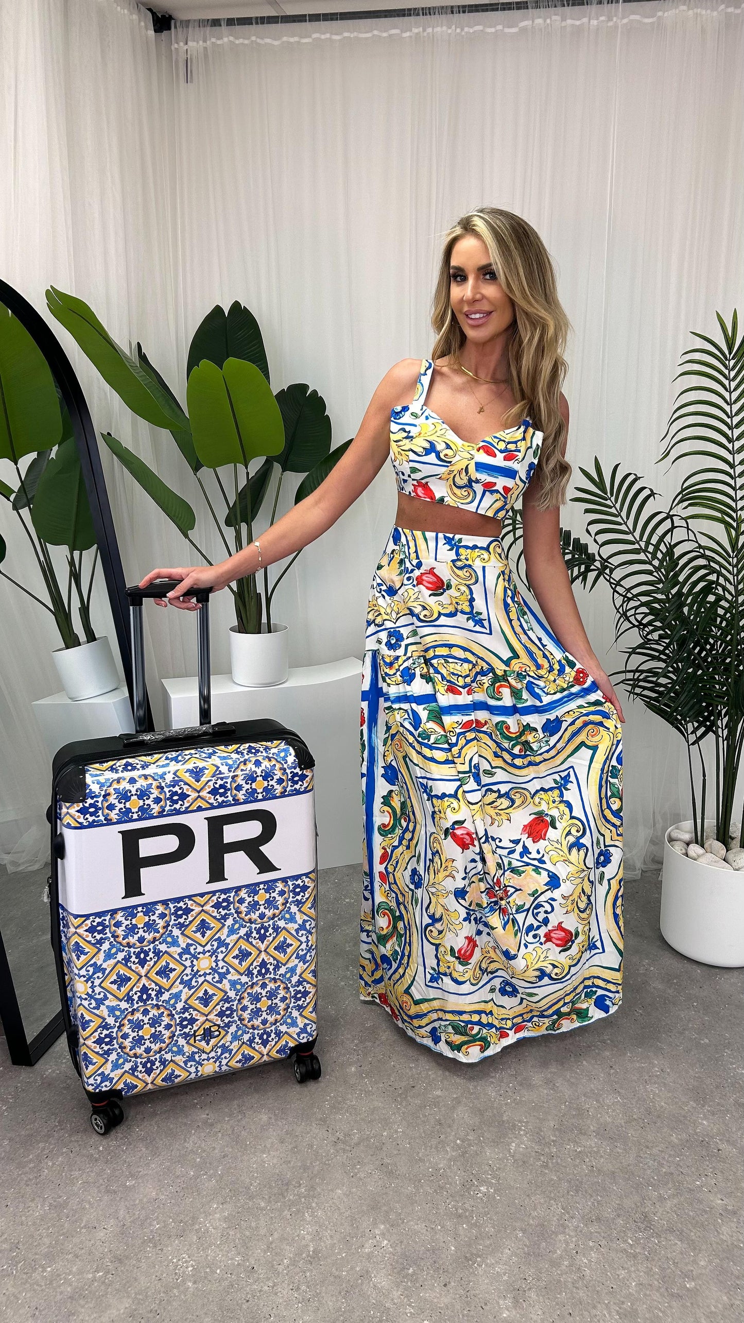 Lifestyle image featuring the Amalfi 2-Piece Set against a scenic backdrop, highlighting its chic summer vibe and versatility.