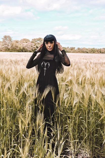 Luxurious black velvet maxi dress featuring gothic horn embroidery and a square neckline, expertly designed for elegance and style.