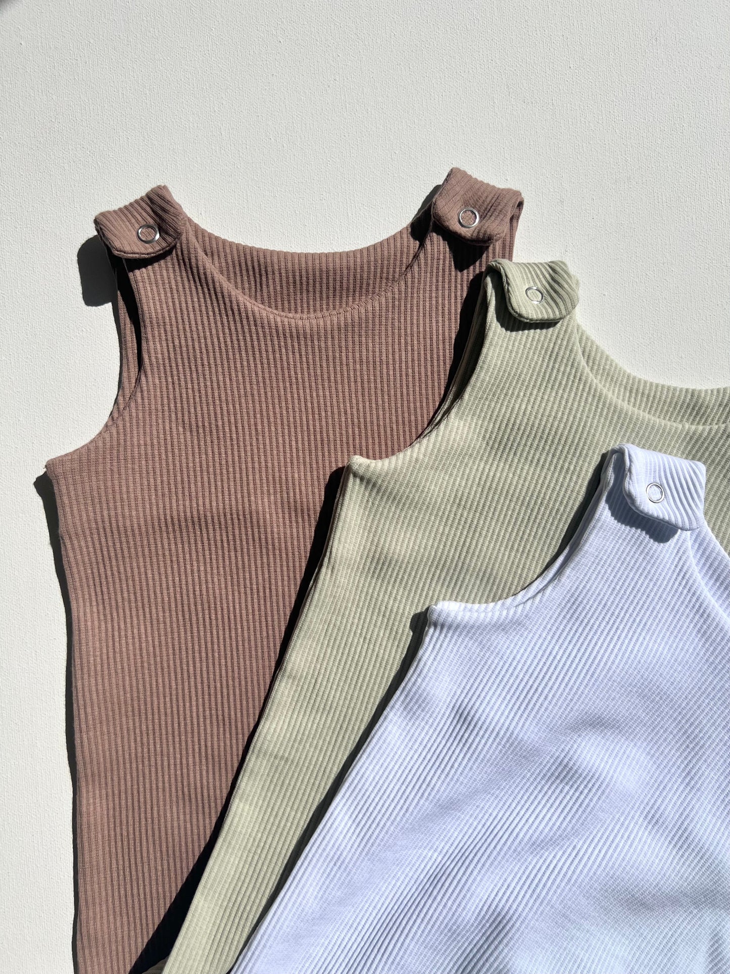 DreamBuy's custom baby dungarees romper, designed for boys and girls aged 0-3 years, featuring exquisite embroidery and a soft ribbed fabric.