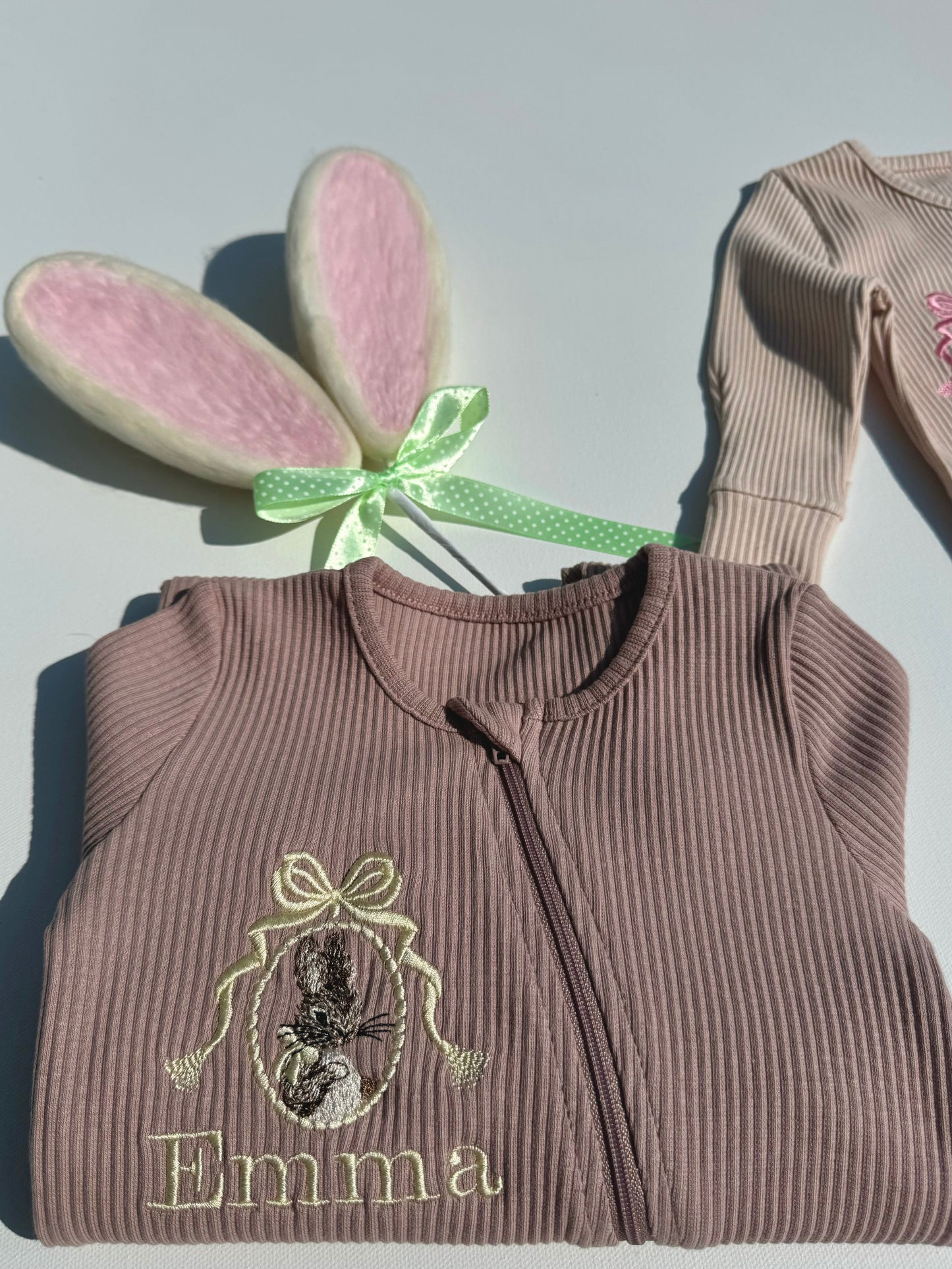 Luxurious personalized Bunny Zip Sleepsuit for babies by DreamBuy, featuring delicate embroidery and soft ribbed fabric, perfect for Easter celebrations.