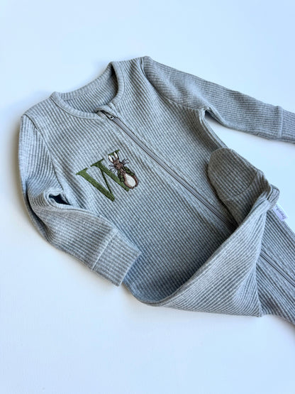 DreamBuy's versatile Woodland Bunny zip romper available for babies aged 0-36 months, perfect for gifting.