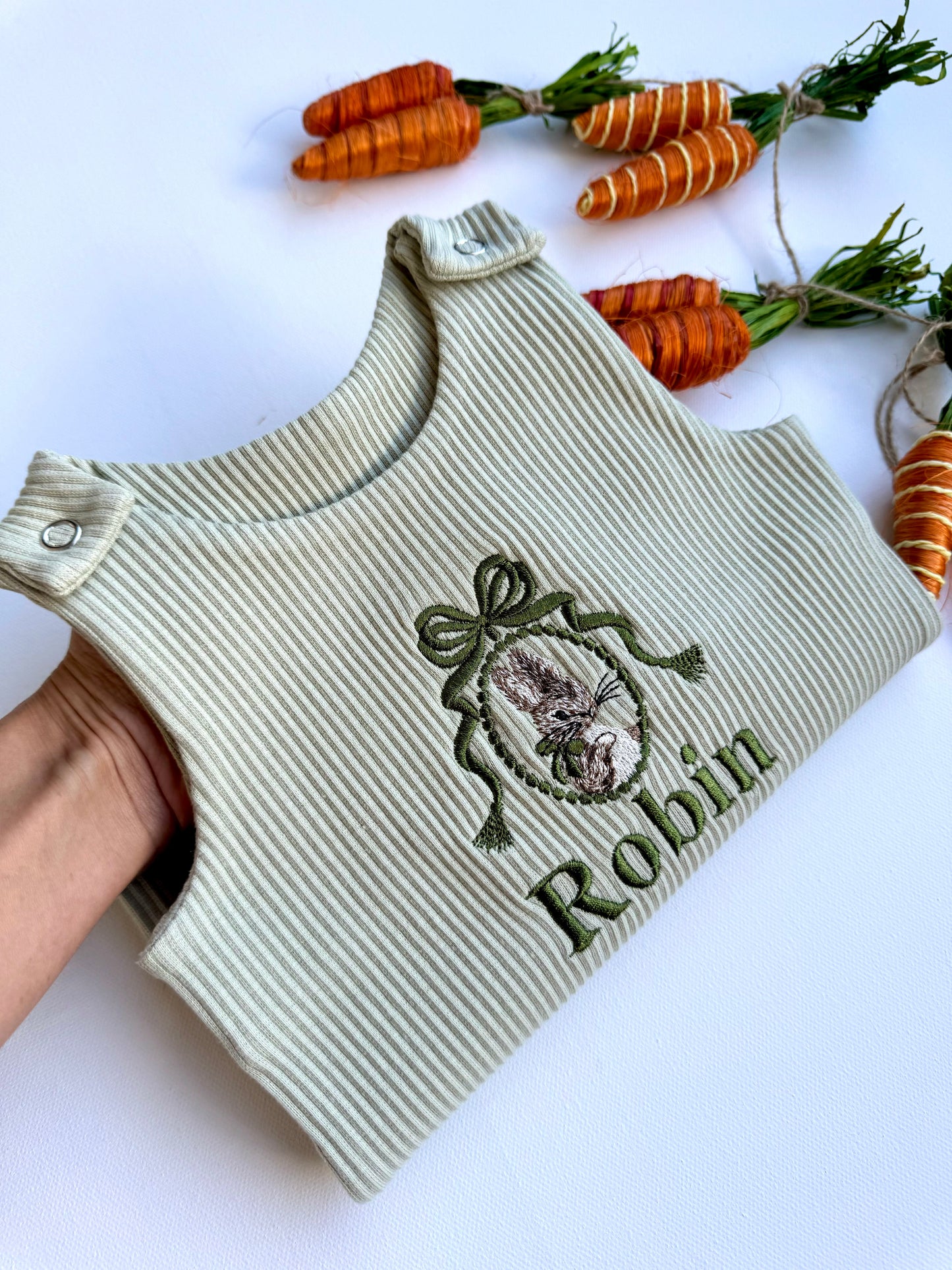 Elegant personalised Easter Bunny baby dungarees by DreamBuy, crafted from soft cotton, featuring exquisite embroidered bunny design, perfect gift for infants celebrating their first Easter.