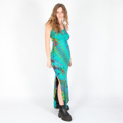 Close-up of vibrant tie-dye pattern on luxurious bodycon maxi dress, perfect for summer events and beachside gatherings with a flattering fit.