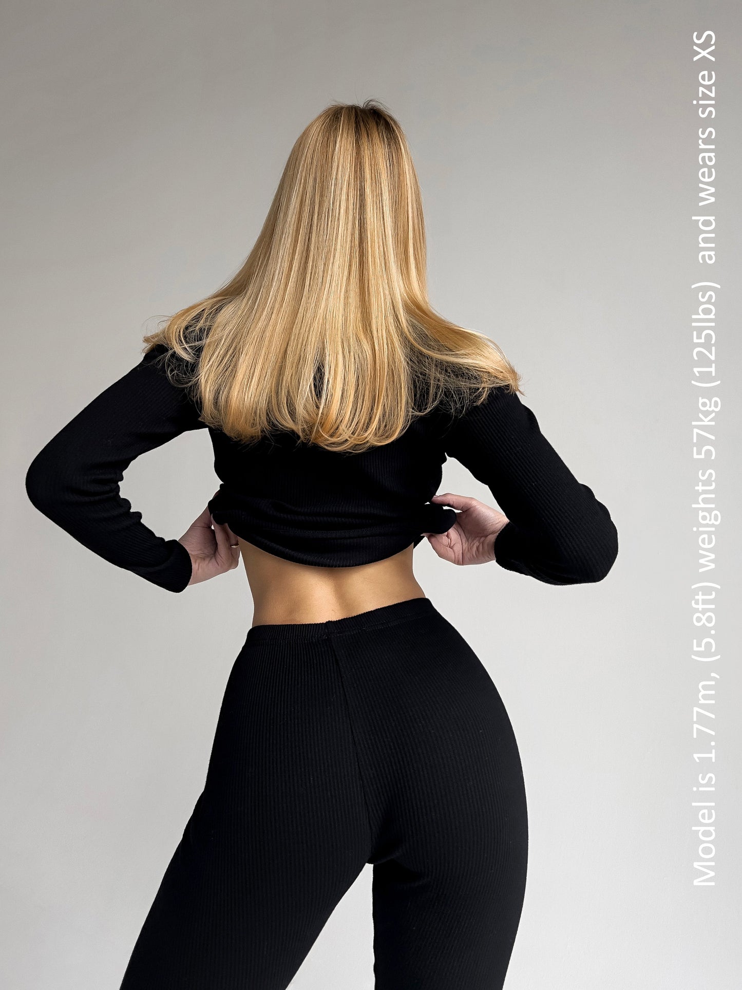 Chic and simple design of DreamBuy's black family loungewear, ideal for Christmas gatherings, showcasing trendy outfits that unite the family in style and comfort.