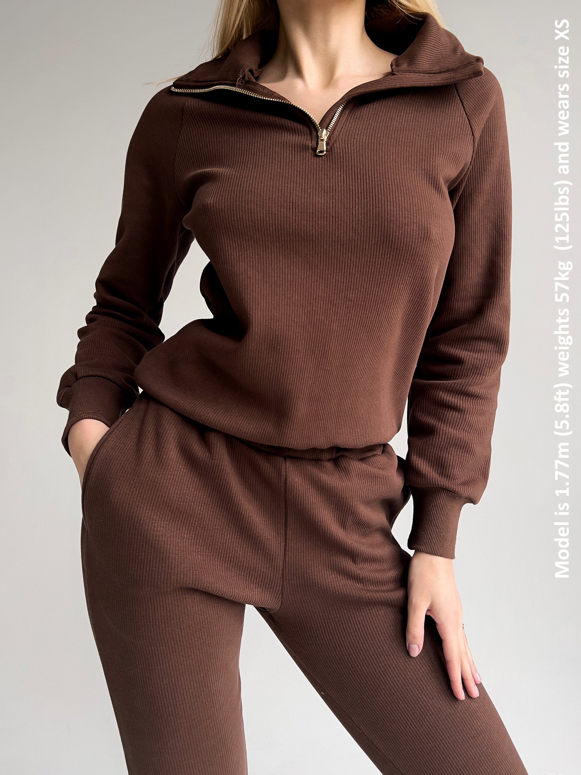 DreamBuy's luxurious cotton fleeced tracksuit, designed with functional pockets and a stylish ribbed texture in a sophisticated walnut shade.