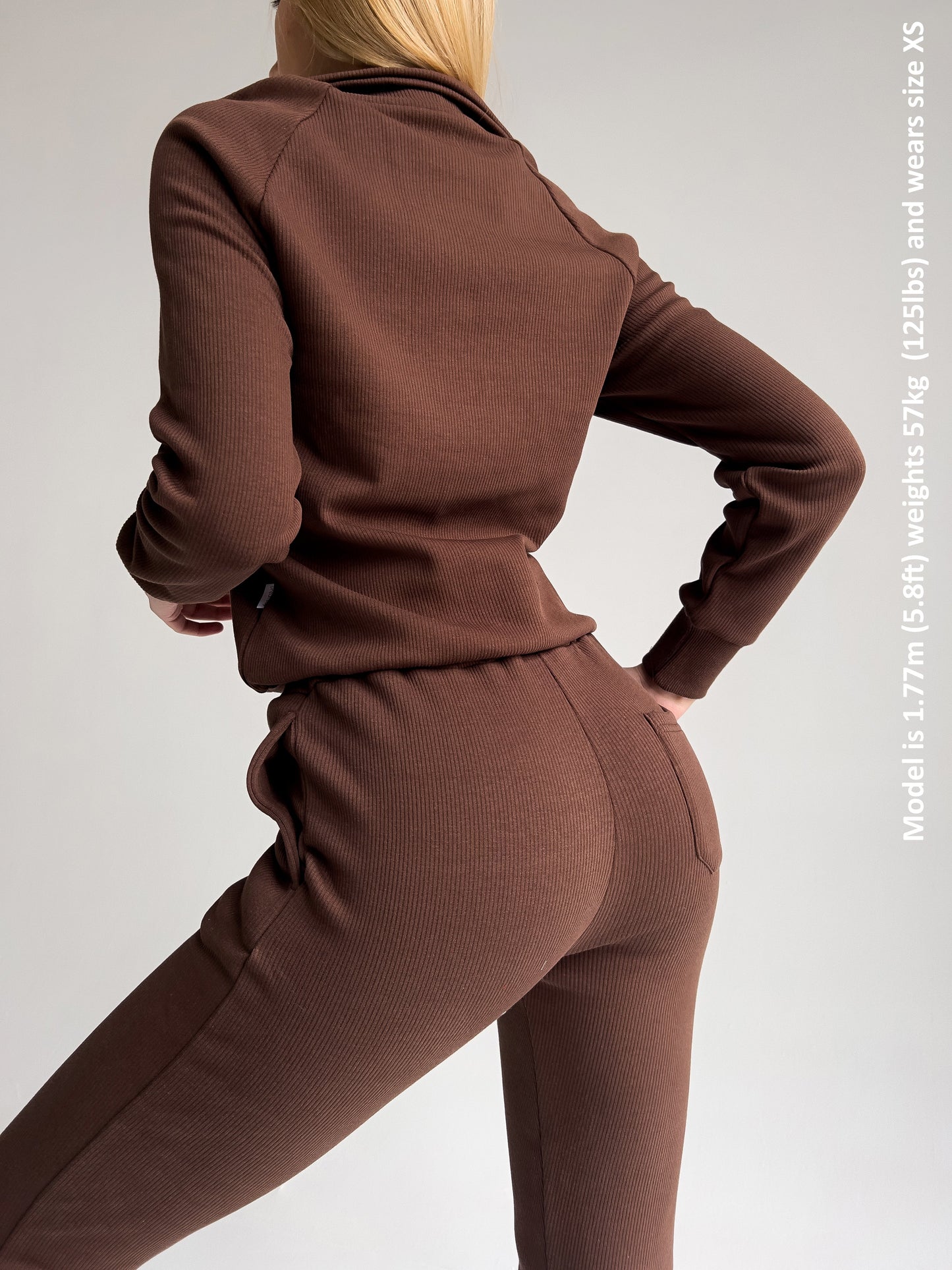 Chic walnut-colored tracksuit from DreamBuy, highlighting its double-layered collar and ultimate comfort for all-day wear.