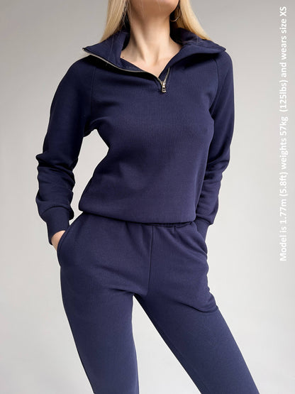 Close-up view of DreamBuy's ribbed cotton fleeced tracksuit material, highlighting its soft fleece texture and premium quality.