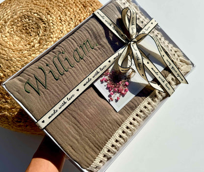 Luxurious taupe personalized muslin baby blanket by DreamBuy, made from 100% cotton, measuring 100x120 cm, perfect as a keepsake gift for newborns.