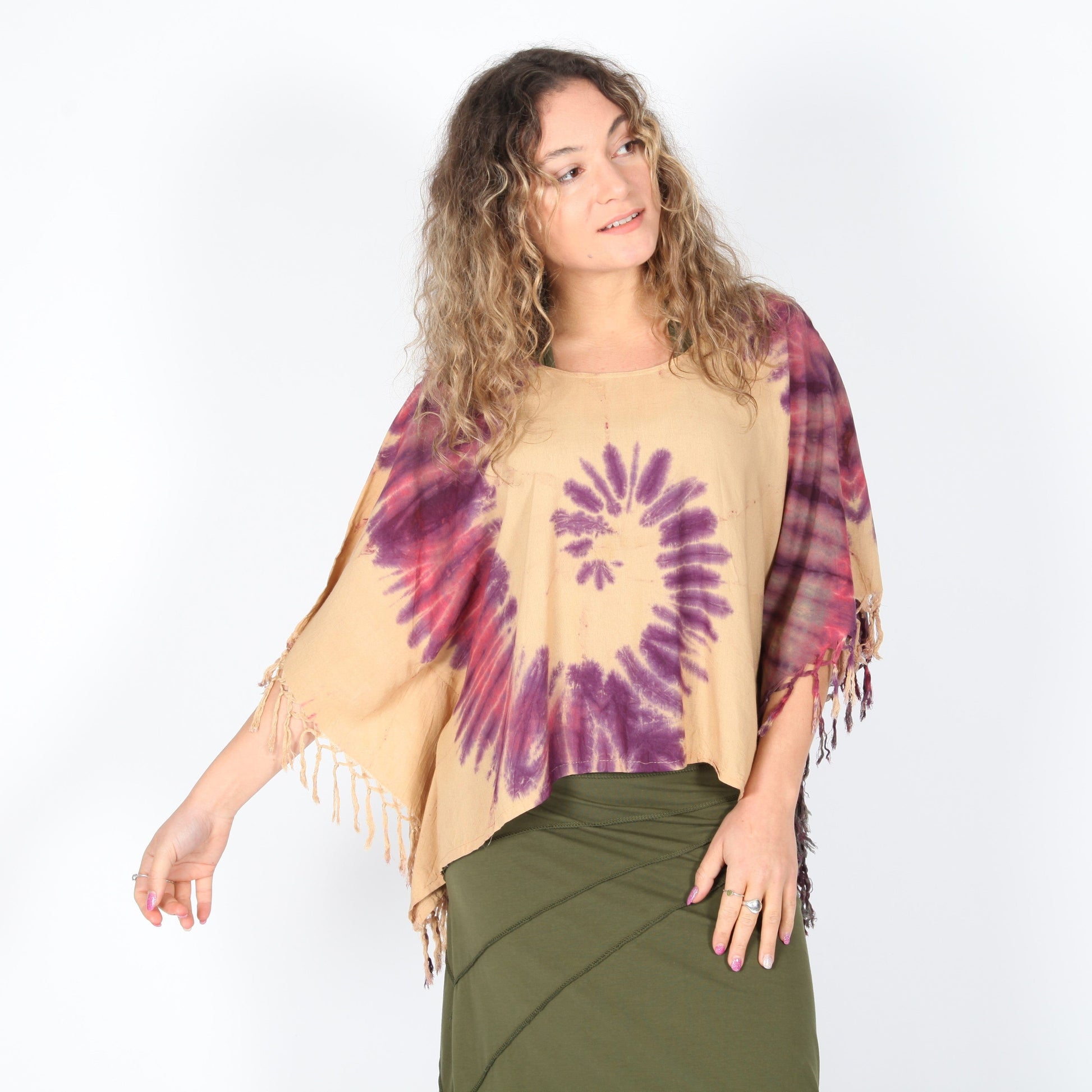 Front view of the Luxury Tie Dye Cropped Poncho displaying rich colours and the unique spiral pattern, designed for all-day comfort.