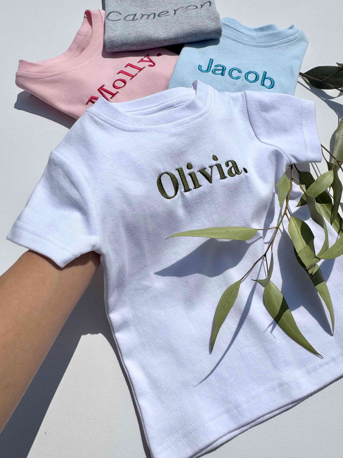 High-quality breathable crewneck t-shirt for kids featuring custom embroidery, crafted by DreamBuy.