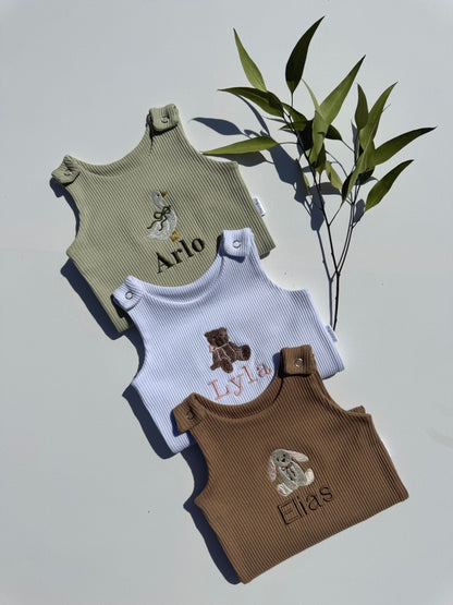 Luxury personalised safari dungarees for baby 0-3 years by DreamBuy, featuring embroidered jungle animals like lions and giraffes, crafted from soft, high-quality fabric.