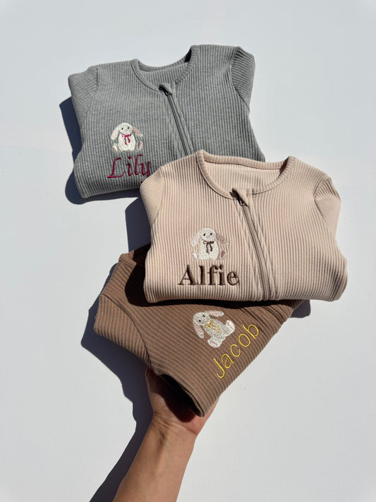 Luxurious personalised bunny zip romper for baby by DreamBuy, featuring exquisite safari animal embroidery on soft cotton fabric.