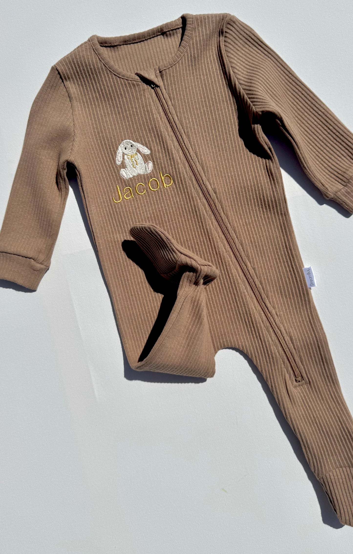Luxury personalised bunny zip romper for baby by DreamBuy, featuring exquisite safari animal embroidery.