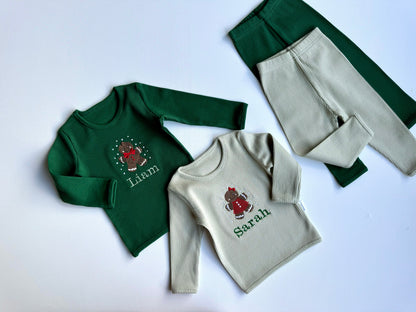 Elegant display of DreamBuy's Christmas Gingerbread Man Lounge Set for Adults and Kids, featuring intricate gingerbread prints and soft fabric.