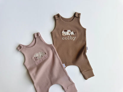 High-quality baby dungarees from DreamBuy, adorned with charming safari animal embroidery, ideal for a luxury baby wardrobe.