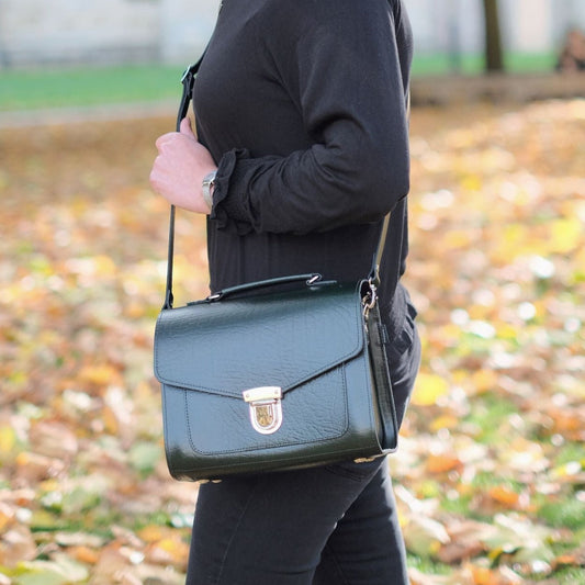 Close-up of the premium textured leather of the Executive Sugarcube Grande Bag, highlighting its rich British Racing Green colour.